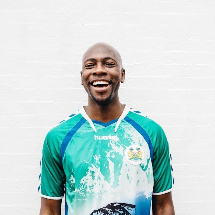 Ava Singh, Lead Design Curator at Global Life Balancehub, reviewing corporate floral arrangements